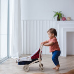 PlanToys Doll Stroller – Wooden Push Toy with Reversible Carrier for Kids - view 5