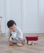 PlanToys Doll Feeding Set – Wooden Pretend Play Set with Bag, Bib and Baby Bottle for Kids - view 3