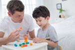 PlanToys Stacking Game – Wooden Dice Stacking Game with 12 Colorful Blocks for Kids - view 5