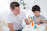 PlanToys Stacking Game – Wooden Dice Stacking Game with 12 Colorful Blocks for Kids - view 6