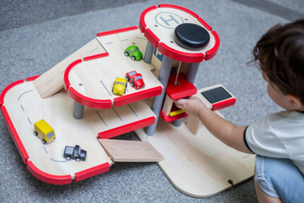 PlanToys Parking Garage – 3 Floor Wooden Play Set with Elevator Tower, Helipad and Charging Station, Ages 3+ - view 2