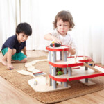 PlanToys Parking Garage – 3 Floor Wooden Play Set with Elevator Tower, Helipad and Charging Station, Ages 3+ - view 4