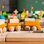 PlanToys Cargo Train – 3 Magnetic Connecting Wooden Trains with Cargo Slots, Brown and Yellow for Kids - view 3