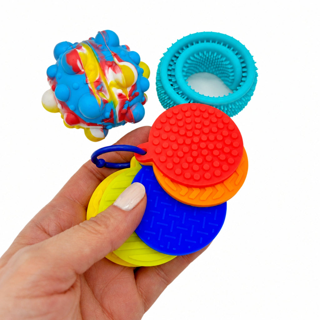 Fun_Focus3_be72c31b-8ce9-43b5-8e6d-39a226dcc887.jpg Mindware Sensory Genius Fun & Focus Pack – Textures Fidget Toy Set with Wearable Bracelet for Kids Ages 5+